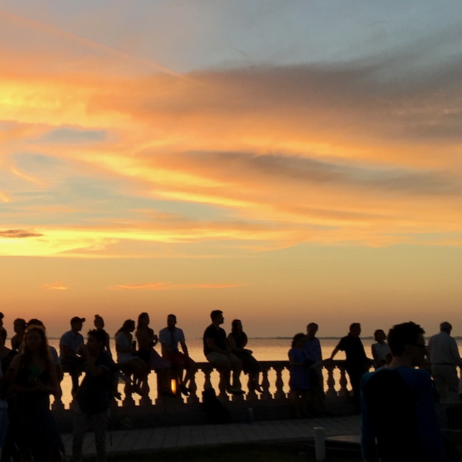 sunset with silhouettes of people