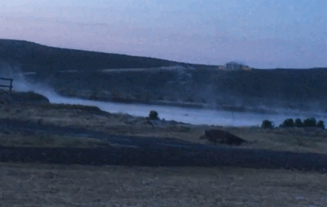 A GIF of steam rising off the hot springs at sunrise