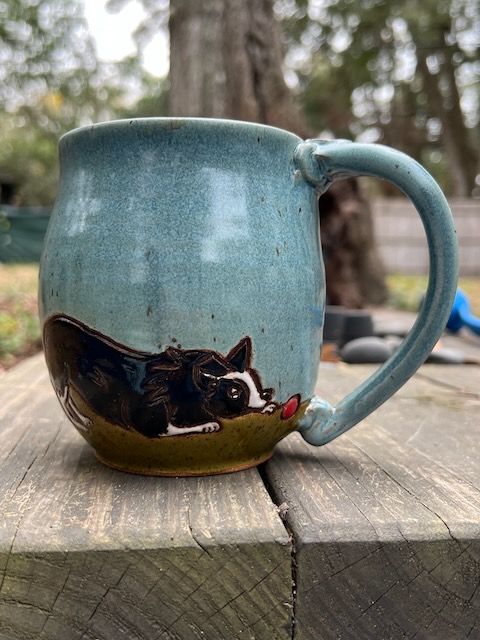 a mug with a border collie on it 